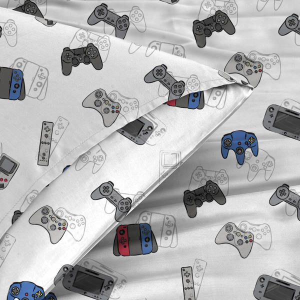 video gamer sheet set. white with mostly grey gamer controls. some controllers are blue and some are red, gray and blue. sheet set is for twin size bed